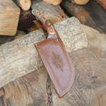 Köse Mehmet Yatağan el işçiliği 4034 paslanmaz çelik, 57 HRC sertliğe sahip Almazan bıçak; kesici ağız ve sapın yakın plan detayı.