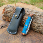 Hafif ve dayanıklı 4034 çelikten yapılmış ceviz-epoksi saplı katlanır bıçak