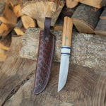 N690 çelik ve ceviz saplı el yapımı Puukko bıçağı detaylı görünümü
