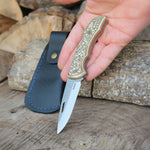 N690 çelikten yapılmış, pirinç gravür saplı katlanabilir el yapımı bıçak – Denizli Yatağan üretimi